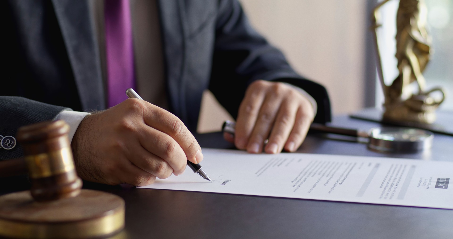 Lawyer Signing Official Document